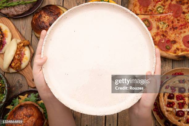 served dining table with empty plate - cheeseburger pie stock pictures, royalty-free photos & images
