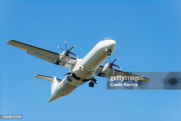 passenger aircraft on approach to an airport - swiftair - airbus cockpit stock pictures, royalty-free photos & images