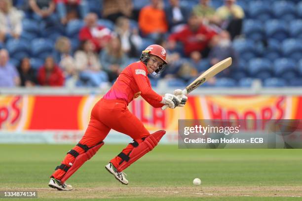 Georgia Redmayne of Welsh Fire hits a four during The Hundred match between Welsh Fire Women and London Spirit Women at Sophia Gardens on August 18,...