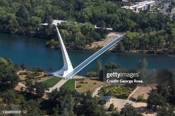 The iconic Sundial Bridge over the Sacramento River, designed by Santiago Calatrava and completed in 2004, is viewed on August 4 near Redding,...