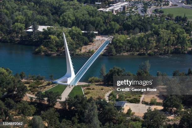 The iconic Sundial Bridge over the Sacramento River, designed by Santiago Calatrava and completed in 2004, is viewed on August 4 near Redding,...