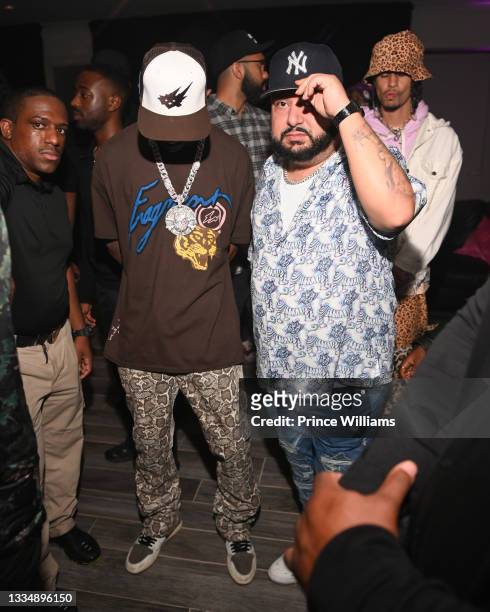 Travis Scott and Cash XO attend Young Thug's 30Th Birthday Party at a private location on August 16, 2021 in Atlanta, Georgia.