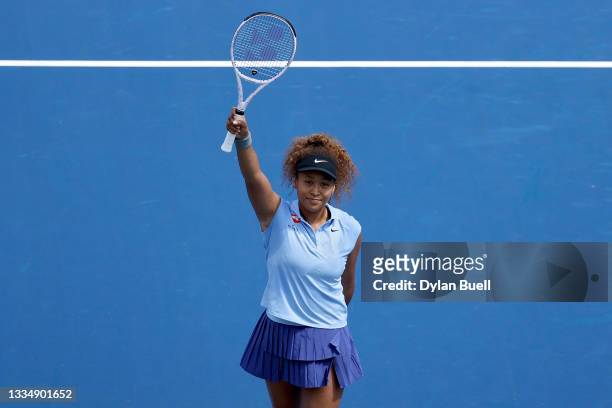 Naomi Osaka of Japan celebrates after defeating Cori Gauff 6-4, 3-6, 6-4 during Western & Southern Open - Day 4 at Lindner Family Tennis Center on...