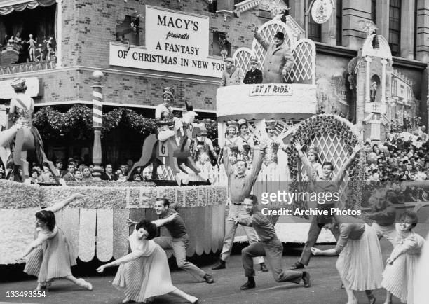 Parade float advertising the Broadway musical 'Let It Ride' during the Macy's Day Parade at Thanksgiving in New York City, 26th November 1961. The...