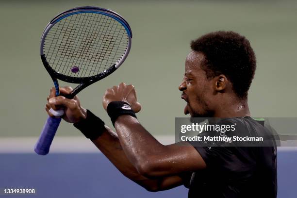 Gael Monfils of France celebrates his 500th career win after defeating Alex De Minaur of Australia during the Western & Southern Open at Lindner...