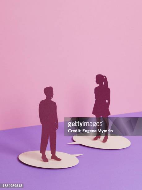 couple standing on speech bubble - job dating foto e immagini stock