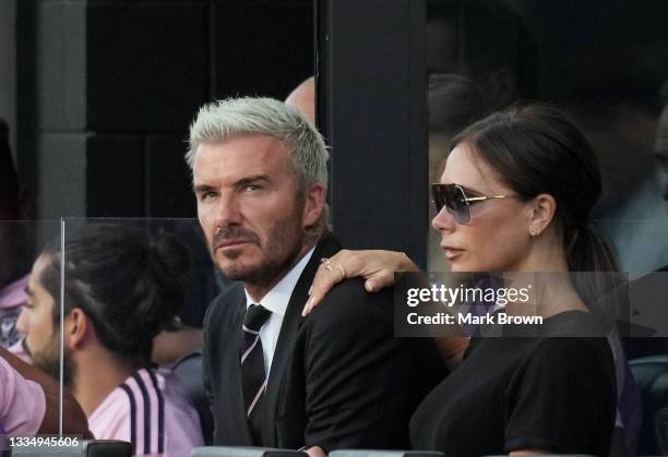 Owner & President of Soccer Operations David Beckham of Inter Miami CF and his wife Victoria Beckham watch the match against Chicago Fire FC during...