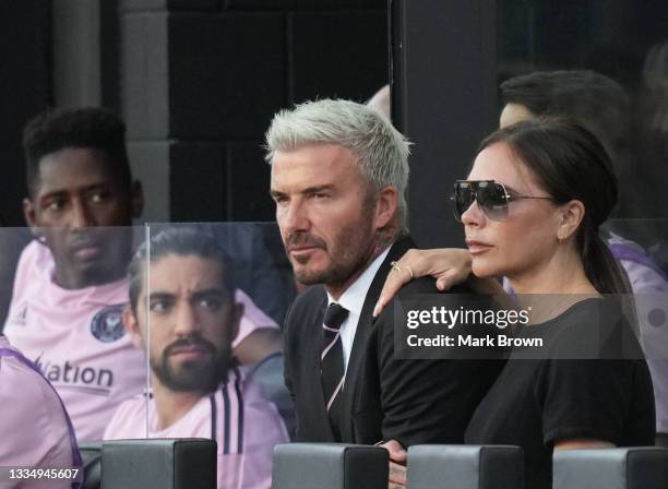 Owner & President of Soccer Operations David Beckham of Inter Miami CF and his wife Victoria Beckham watch the match against Chicago Fire FC during...