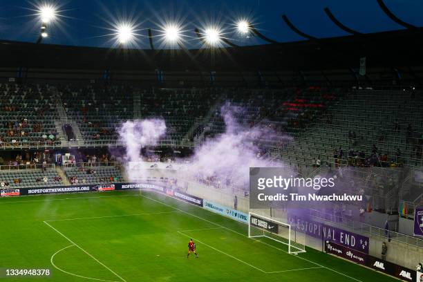 Smoke rises during the first half between Racing Louisville FC and Chicago Red Stars at Lynn Family Stadium on August 18, 2021 in Louisville,...