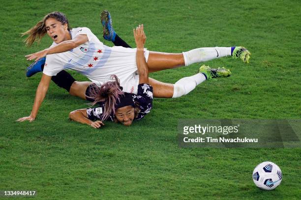 Katie Johnson of Chicago Red Stars fouls Yuki Nagasato of Racing Louisville FC during the first half at Lynn Family Stadium on August 18, 2021 in...