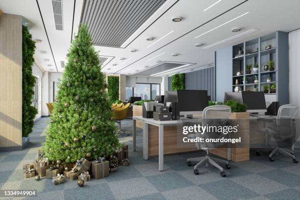 christmas tree with ornaments and gift boxes in eco friendly open plan office - christmas office party stock pictures, royalty-free photos & images