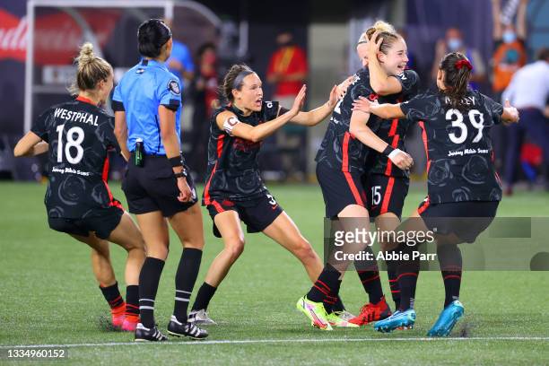 Portland Thorns FC celebrate the goal by Olivia Moultrie of Portland Thorns FC to tie the game 2-2 in the second half during the Women's...