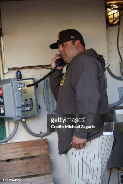 Catching and Quality Control Coach Rod Barajas of the San Diego Padres in the dugout before the game against the Oakland Athletics at RingCentral...