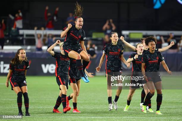 The Portland Thorns FC celebrate a stop by goalkeeper Shelby Hogan of Portland Thorns FC during penalties during the Women's International Champions...