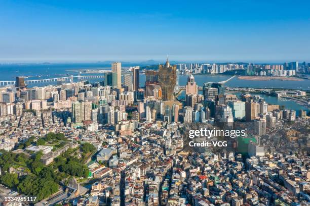 Aerial view of commercial and residential buildings on August 17, 2021 in Macao, China.