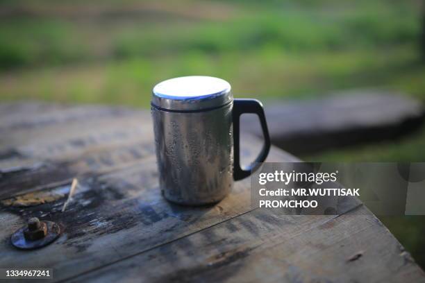 thermos mug. - flask stock pictures, royalty-free photos & images