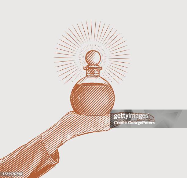 hand holding essential oil bottle - narcotics anonymous stock illustrations