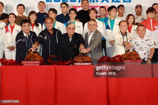 Timothy Fok Tsun-ting , President of the Sports Federation & Olympic Committee of Hong Kong, and actor Eric Tsang Chi-wai attend a celebration party...