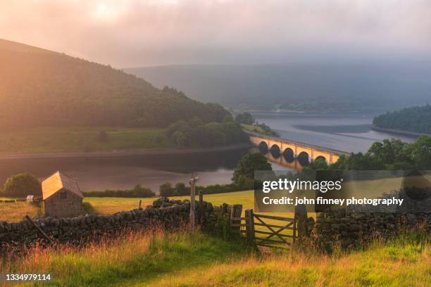 ladybower reservoir sunrise. english peak district. - dambusters stock pictures, royalty-free photos & images