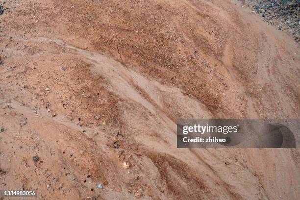 red soil mud flat ground - mud riverbed stock pictures, royalty-free photos & images