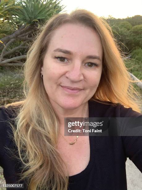 a 49 year old lady looking at the camera - woman selfie stock pictures, royalty-free photos & images