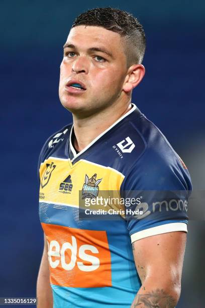 Ash Taylor of the Titans looks dejected during the round 23 NRL match between the Gold Coast Titans and the Melbourne Storm at Cbus Super Stadium, on...