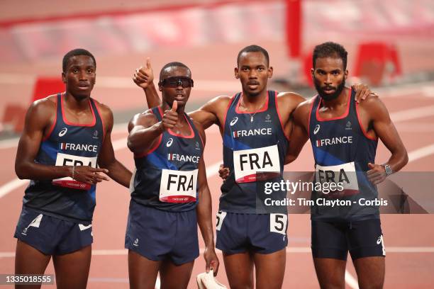 August 6: The French team of Thomas Jordier, Muhammad Kounta, Ludovic Ouceni and Gilles Biron after the 4x 400m round one heat two race during the...