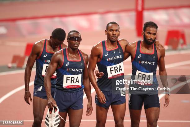 August 6: The French team of Thomas Jordier, Muhammad Kounta, Ludovic Ouceni and Gilles Biron after the 4x 400m round one heat two race during the...