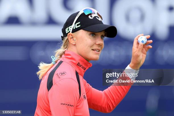 Madelene Sagstrom of Sweden acknowledges the crowd following a bogey on the eighteenth hole during Day One of the AIG Women's Open at Carnoustie Golf...