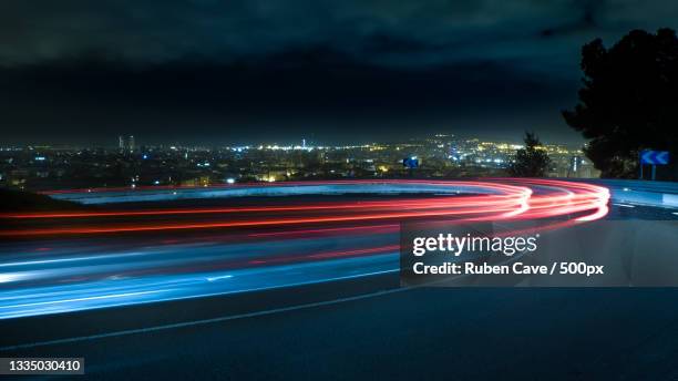 high angle view of light trails on road at night,barcelona,spain - exposição longa imagens e fotografias de stock