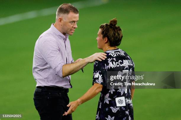 Head coach Christy Holly of Racing Louisville FC speaks with Savannah McCaskill against Chicago Red Stars at Lynn Family Stadium on August 18, 2021...