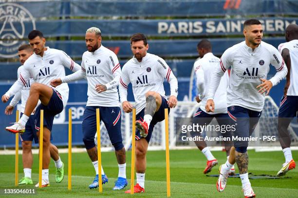 Marco Verratti, Leandro Paredes, Neymar Jr, Lionel Messi and Leandro Paredes warmup during a Paris Saint-Germain training session at Ooredoo Center...