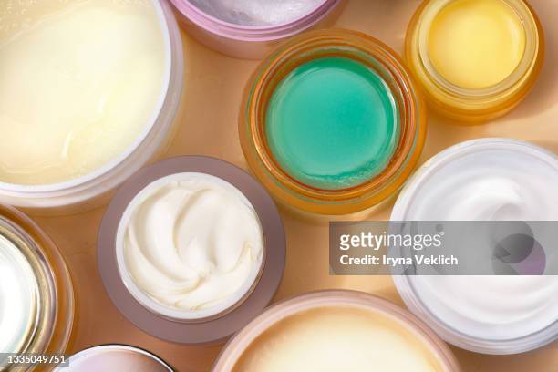 skincare scrubs, clay masks, salt treatments and softness creams on natural color background. - hair texture stock pictures, royalty-free photos & images
