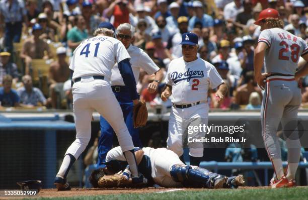 Los Angeles Dodgers Mike Scioscia lays unconscious after violent collision at home plate with Cardinals Jack Clark during playoff series of the Los...