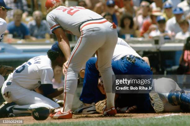 Los Angeles Dodgers Mike Scioscia lays unconscious after violent collision at home plate with Cardinals Jack Clark during playoff series of the Los...