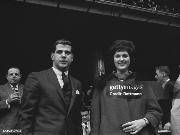 Lynda Bird Johnson, daughter of the President, attends third game of the World Series. Her escort is Ken Rosen of New York City.