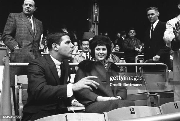 Lynda Bird Johnson, daughter of the President, attends third game of the World Series. Her escort is Ken Rosen of New York City.