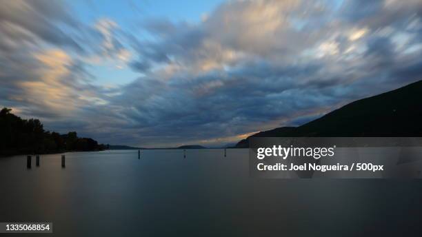 scenic view of lake against sky at sunset,lac de bienne,switzerland - bienne_switzerland stock pictures, royalty-free photos & images