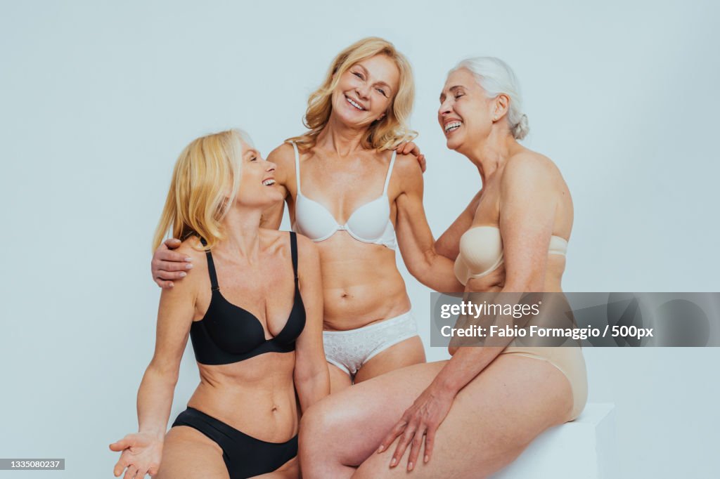 Portrait Of Elder Women In Undergarments Celebrating Body