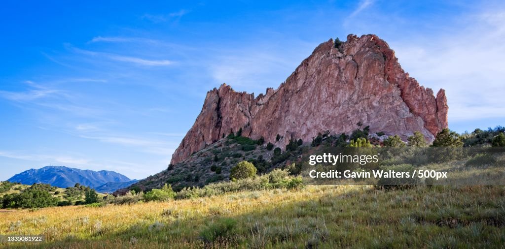 Scenic view of rock formation against sky