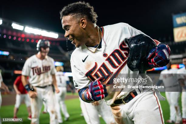 Jorge Polanco of the Minnesota Twins celebrates after hitting a walk-off single against the Cleveland Indians on August 16, 2021 at Target Field in...