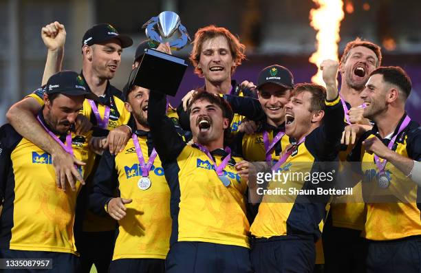 Glamorgan captain Kiran Carlson lifts the trophy after winning the Royal London Cup Final between Glamorgan and Durham at Trent Bridge on August 19,...