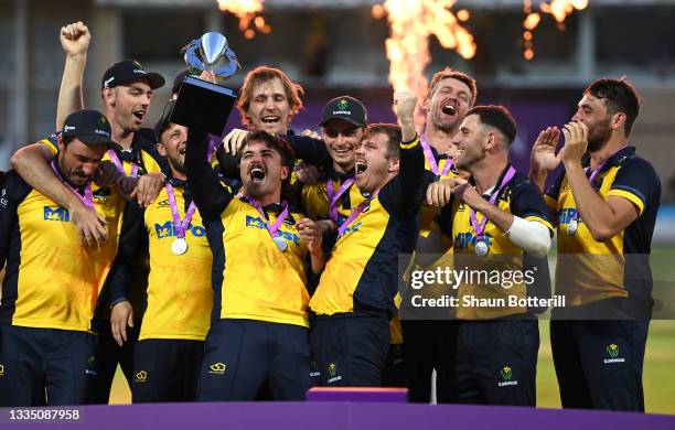 Glamorgan captain Kiran Carlson lifts the trophy after winning the Royal London Cup Final between Glamorgan and Durham at Trent Bridge on August 19,...