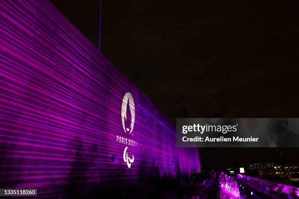 Paris 2024 headquarters "The Pulse" is lit up to celebrate the launch of the International Paralympic Committee’s WeThe15 campaign on August 19, 2021...