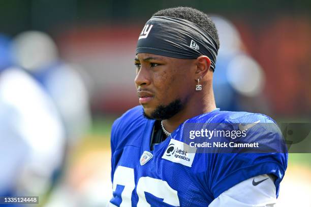 Saquon Barkley of the New York Giants looks on during a joint practice with the Cleveland Browns on August 19, 2021 in Berea, Ohio.