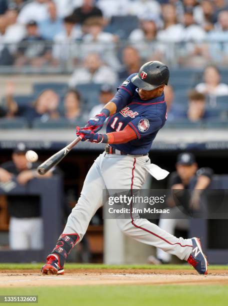 Jorge Polanco of the Minnesota Twins connects on a base hit in the first inning against the New York Yankees at Yankee Stadium on August 19, 2021 in...