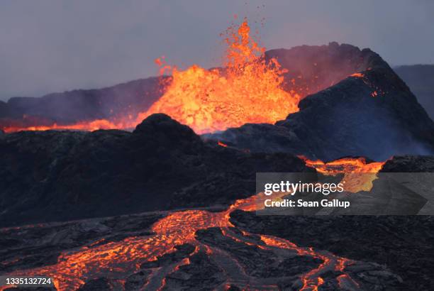 Fargradalsfjall volcano spews molten lava on August 19, 2021 near Grindavik, Iceland. Iceland is feeling a strong impact from global warming. While...