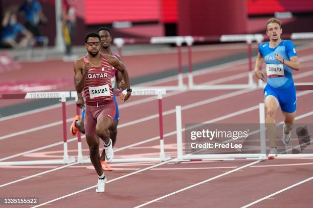 Allison dos Santos of Brazil and Abderrahman Samba of Qatar, in action during the semifinals of the men's 400 metres hurdles at the Olympic Stadium...