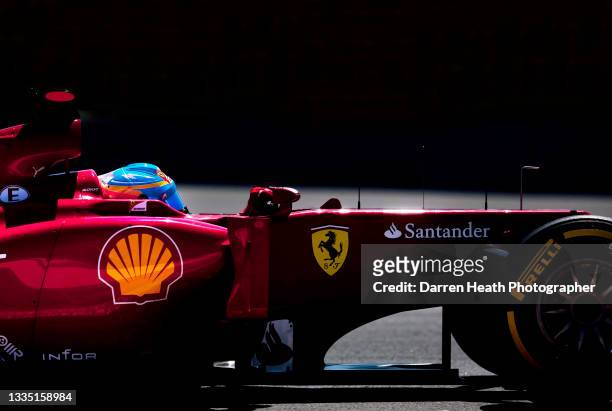 Spanish Scuderia Ferrari Formula One team racing driver Fernando Alonso driving his F2012 racing car during practice for the 2012 European Grand...