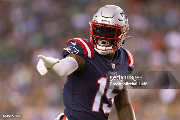 Keal Harry of the New England Patriots points against the Philadelphia Eagles in the preseason game at Lincoln Financial Field on August 19, 2021 in...